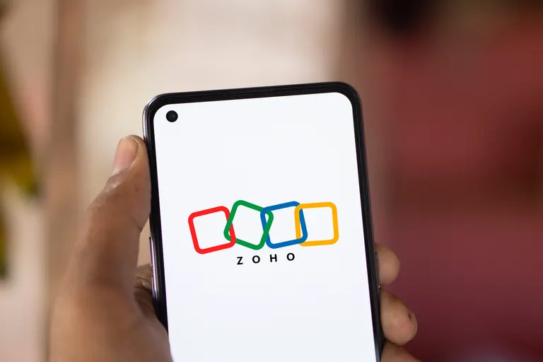 Zoho logo displayed on a smartphone