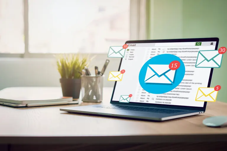 Email campaign notifications displayed on a laptop