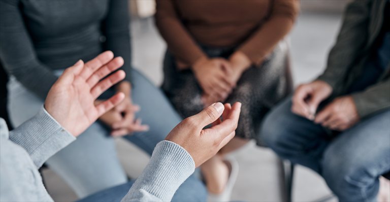 People seated together during a group conversation