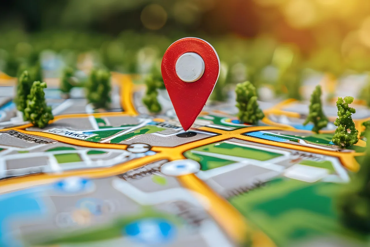 Red location pin placed over a miniature street map